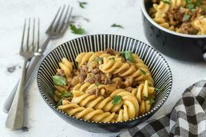 Macaroni with beef meat photo