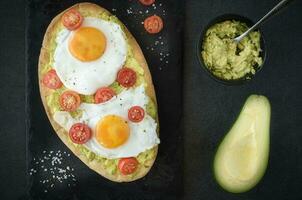 Avocado and egg sandwiches photo