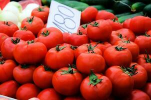 Fresh tomatoes on the market photo