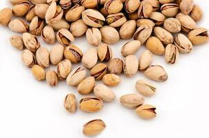 pistachios on white background photo