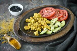 Scrambled eggs and vegetables photo