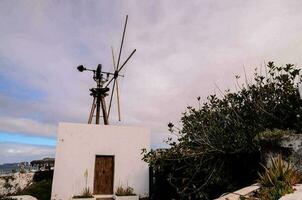 A wood windmill photo