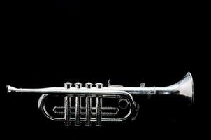 A trumpet on black background photo