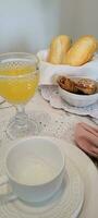 breakfast table with coffee and food photo