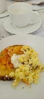 breakfast table with coffee and food photo