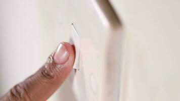 Close up of person hand wiping light switch video