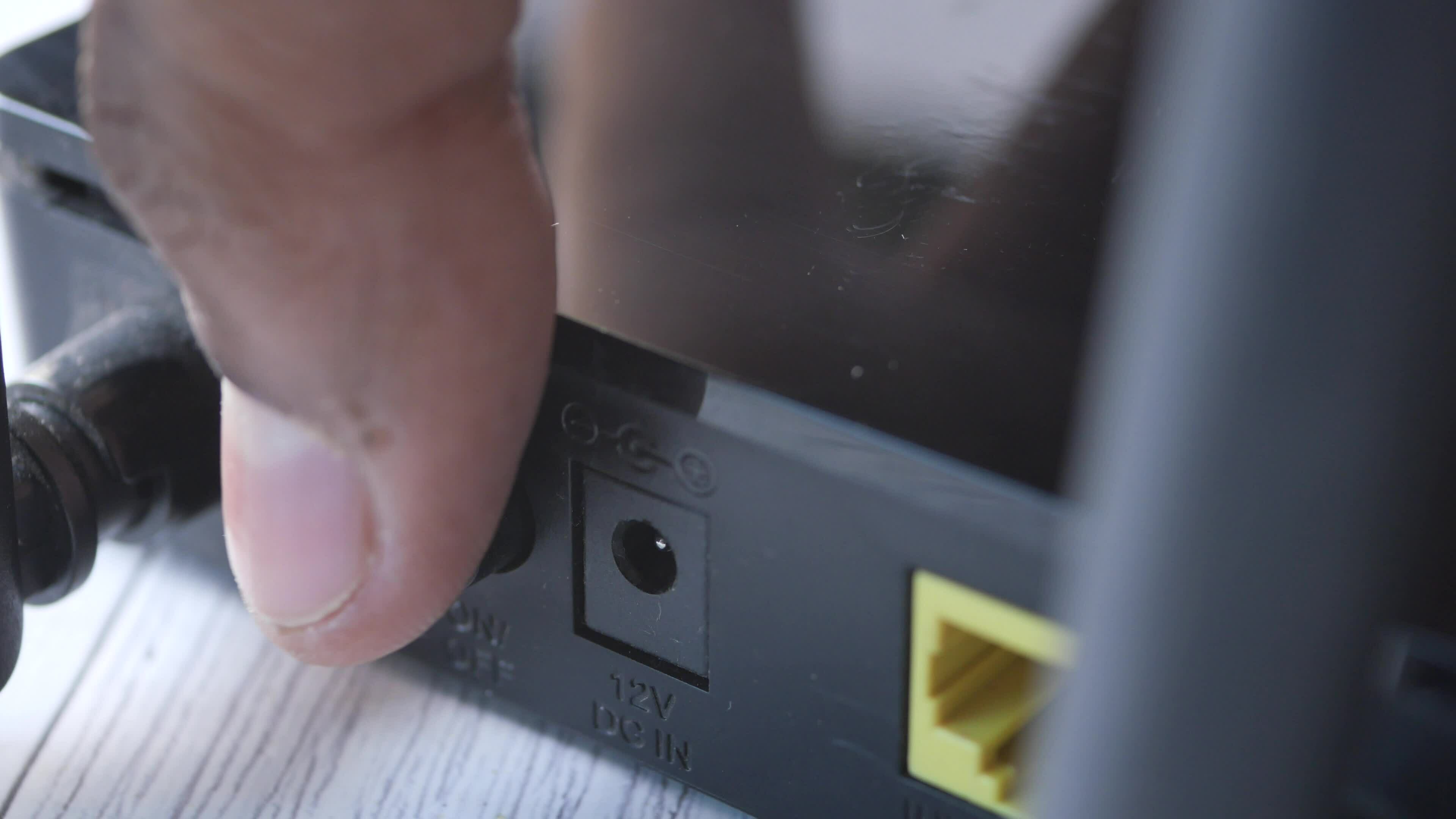 WiFi router with cables on table 23286981 Stock Video at Vecteezy