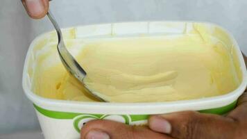 close up of fresh butter in a container video