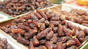 stack of fresh date fruit display for sale at local store in bangladesh video