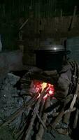 Traditional rural stove for cooking using firewood photo