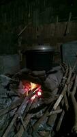 Traditional rural stove for cooking using firewood photo