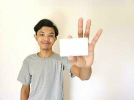 man showing close up empty card to focus on the card. photo