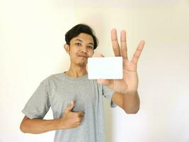 man showing close up empty card to focus on the card. photo