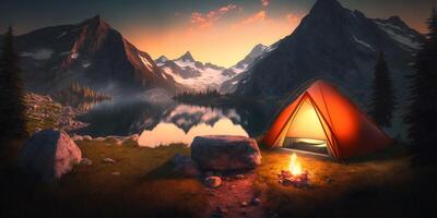 The tourist camping tent is on mountains at sunset time with . photo