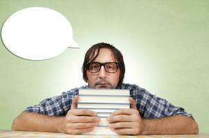 Selfish man with several books photo