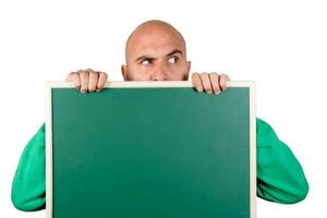 Man holding a blackboard photo