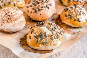 Homemade seeded buns photo