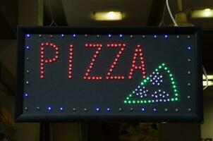 Pizza sign advertise photo