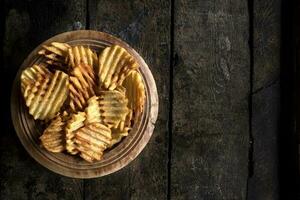 Homemade potato chips photo