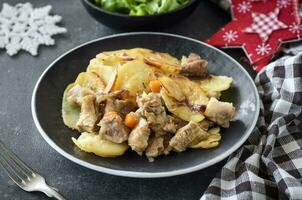Chicken meat with potatoes photo