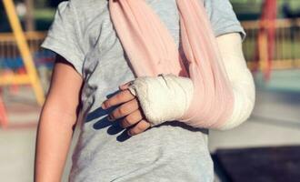 Child with broken hand photo