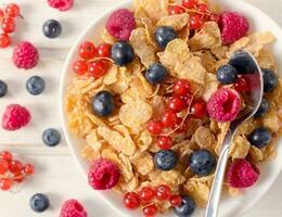 Berries and corn flakes photo