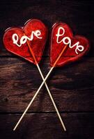 Heart couple lollipops photo