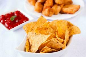Tortilla chips with sauce photo
