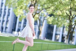 A portrait of a beautiful young Caucasian woman outdoor photo