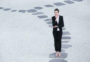 Thoughtful business woman photo