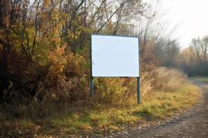 A blank white billboard mockup on a sidewalk in a city photo