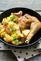 Chicken and potatoes photo