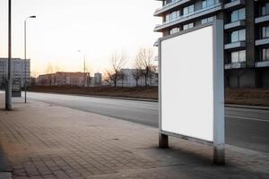A blank white billboard mockup on a sidewalk in a city photo