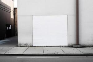 A blank white billboard mockup on a sidewalk in a city photo