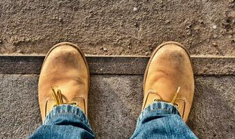 Yellow boots on man photo