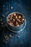 Roasted and salty hazelnuts photo