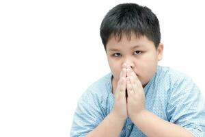 Little asian boy spiritual peaceful praying isolated photo