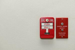 Fire alarm system. Pull danger fire safety box. photo