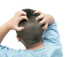 short hair boy itchy his hair on isolated photo