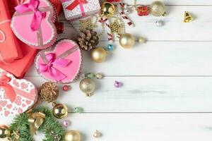 Gift box with colorful small bell and Christmas ball photo