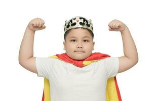 cute obese boy is showing muscle isolated photo