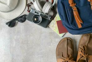 prepare accessories and travel items on marble photo