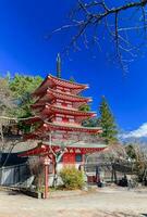 Red pagoda, Chureito is landmark near Fuji mountain photo