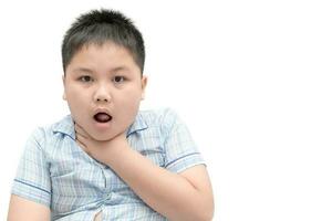 boy gestures with something stuck in his throat photo