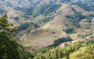 beautiful mountain with rice terraces and fog in morning photo