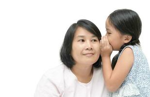 Daughter whispering gossip to her mother isolated photo