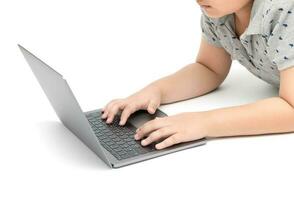 asian fat boy student using laptop to do homework isolated photo