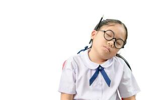 Girl student in uniform sleep on the chair photo