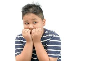 boy with scared terrified facial expression photo