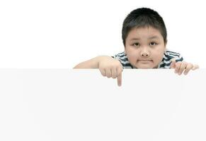 obese fat boy pointing on white banner - isolated on white background with copy space for input text photo